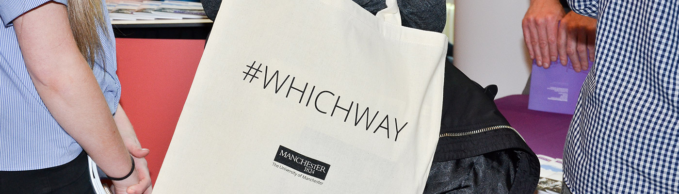 Tote bag with '#whichway' hashtag printed on it.