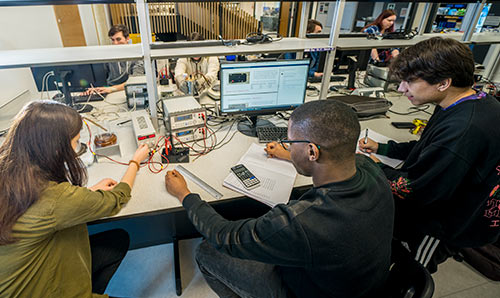 student conducting a physics experiment