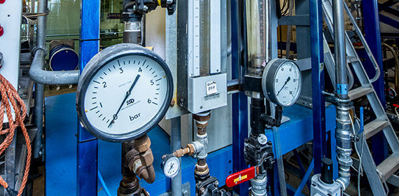 Industrial pipework with pressure gauges