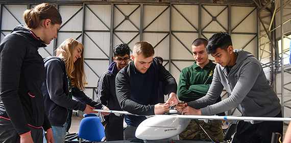 Students building a model plane