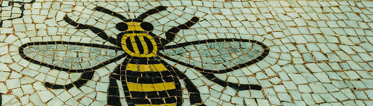 Bee motif on a mosaic floor