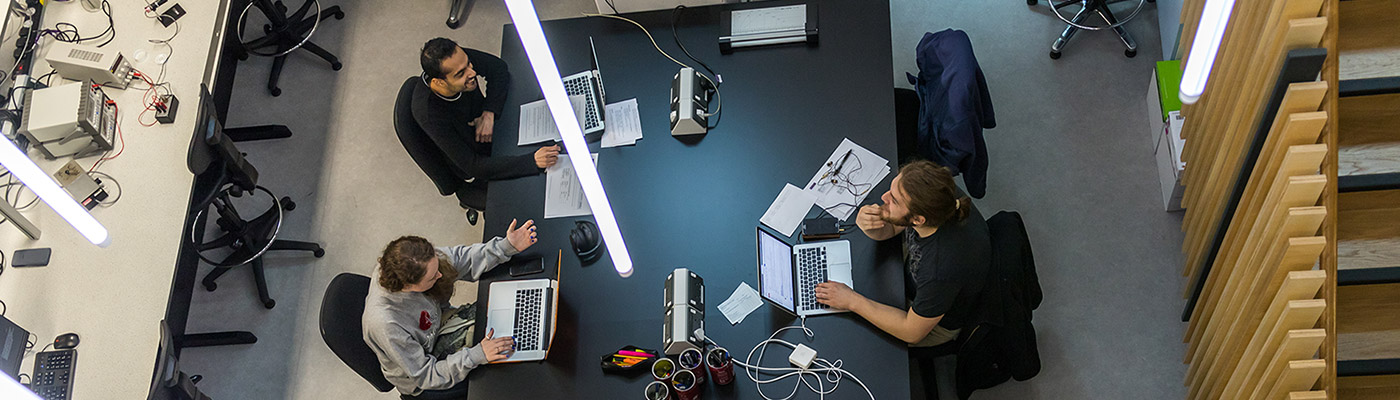 Aerial shot of students working at a table