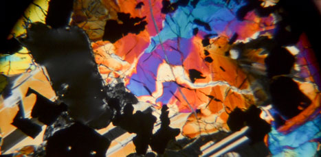 A microscopic view of vibrant coloured paper