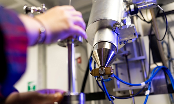 Laboratory equipment and industrial plant icon.