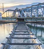 A water system site with setting sun
