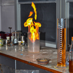 Flames inside a jar on a workbench