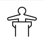 A black outline icon of a person stood at a lecture podium, their arms outstretched either side of them